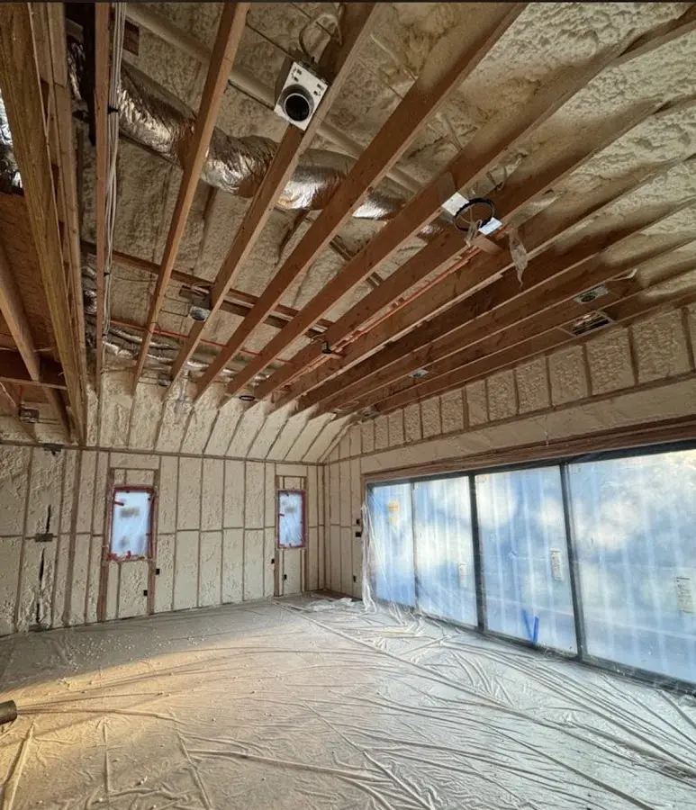 Interior walls and ceiling insulated with spray foam during new construction in Pecan Grove
